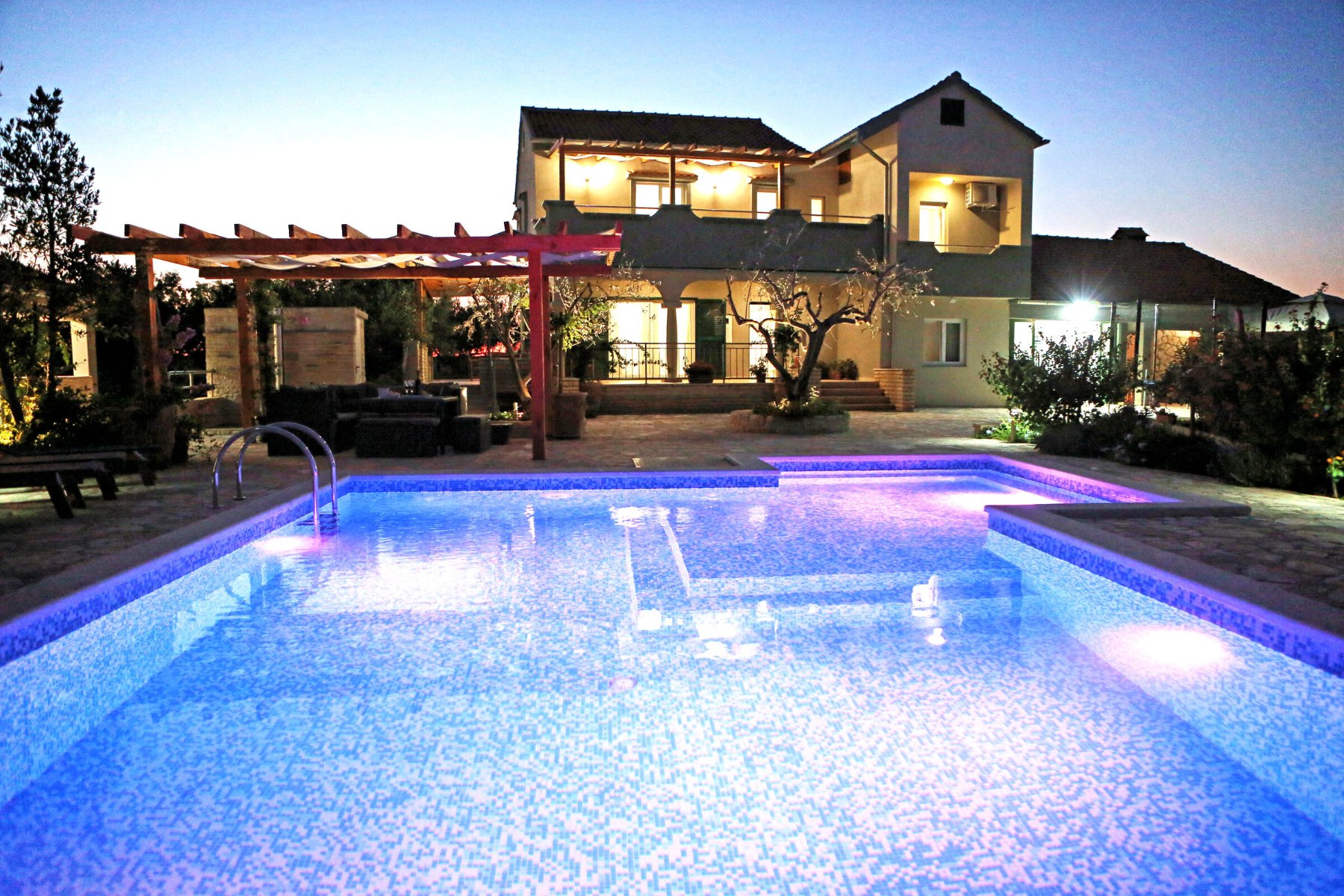 The pool, lit at night